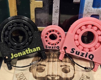 Muffler Bearing Fidget Spinner Keychain: Absurd 3D-Printed Fun