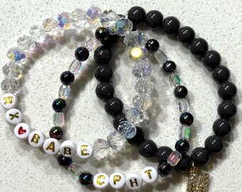 Conjunto de pulseras negras con cuentas de cristal