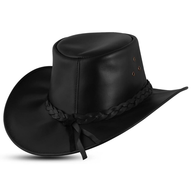 May include: A black leather hat with a wide brim and a braided band around the crown. The hat has a tall, rounded crown and a slightly curved brim. The hat has three small eyelets on the side and a tie. The hat is designed for sun protection.