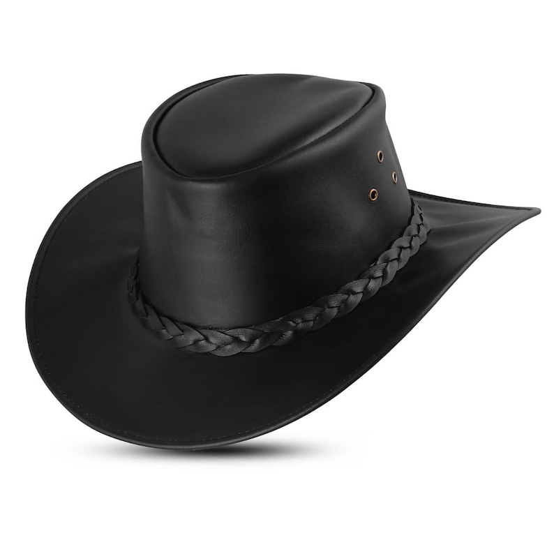 May include: A black leather hat with a wide brim and a braided band around the crown. The hat has a rounded crown and three small rivets on the side. This hat is a classic style, suitable for outdoor activities.