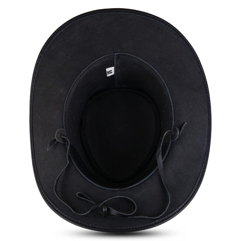 May include: Black cowboy hat with a wide brim and a leather chin strap. The hat has a round crown and a soft, textured appearance. The interior features a tag with a size marking.