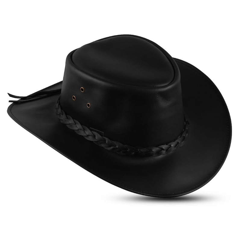 May include: A black leather cowboy hat with a braided band and three small rivets on the crown. The hat has a wide brim and a rounded crown. The hat is made of a smooth, shiny leather material.