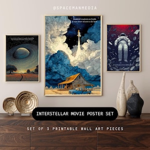 May include: Set of three framed Interstellar movie posters. The artwork features a rocket launch, an astronaut in space, and a surreal landscape. The posters are displayed on a wooden surface with decorative items.