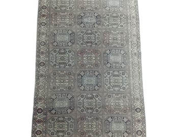 Vintage Turkish Wool Area Rug: 6.4x9.8 ft, Geometric Boho Carpet