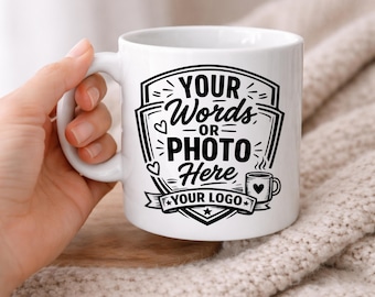 May include: White ceramic mug with a black graphic that reads "YOUR Words -or- PHOTO Here YOUR LOGO". The mug has a handle and a small coffee cup graphic with a heart.