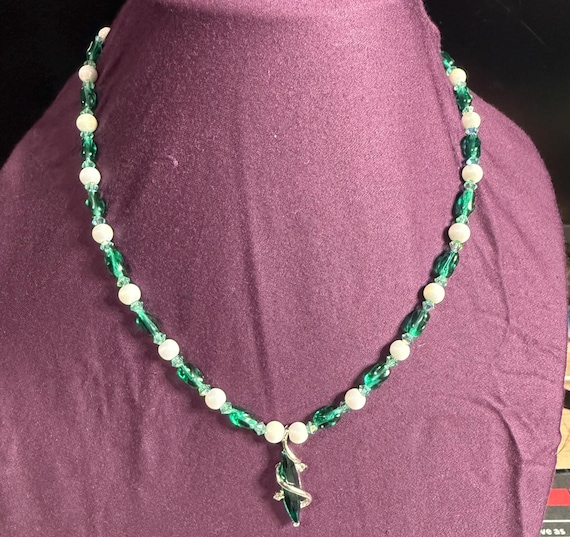 Dark Green Beaded Necklace with Silver Accents and Green Pendant