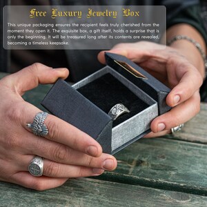 A person's hands holding a black jewelry box with two rings inside, and a description of the jewelry box as a "free luxury jewelry box" with a unique packaging.