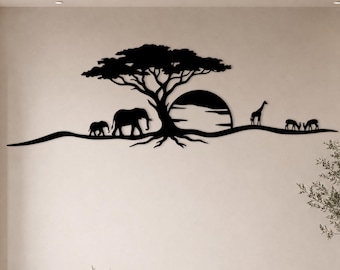 May include: A black metal wall art piece featuring a silhouette of an acacia tree, a large sun, and various African wildlife including an elephant, a calf, a giraffe, and two gazelles, all arranged along a horizontal line on a light wall.
