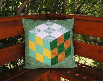 Quilted Cube Pillow Cover in green and firey sunset colors