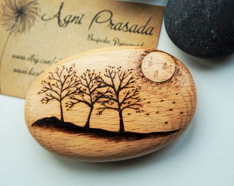 Solid wooden pebble with pyrography tree design. Hand burned one of a kind original mini artwork, perfect good luck charm