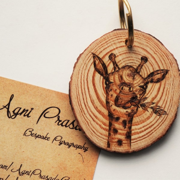 Giraffe keyring on wood slice. Pyrography woodslice keyfob