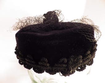 Vintage 1950s 1960s black velvet pillbox Mandarin style hat with topknot and veil by Miss Sally Victor
