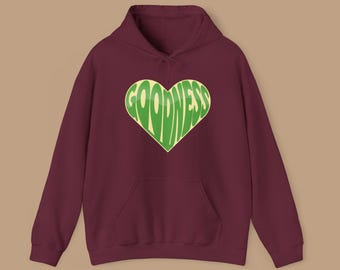 Sudadera con capucha Goodness Heart: una acogedora sudadera con capucha cristiana retro con un gráfico de fe minimalista y ajuste unisex para uso diario.