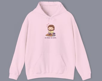 Sudadera con capucha "Go Spread the Gospel", diseño cristiano chibi de Jesús y acogedora sudadera unisex con mensaje de fe para uso diario.