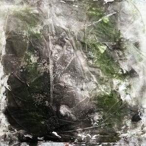 May include: A square piece of textured paper featuring an abstract composition of dark charcoal, black, and deep forest green pigments. The surface displays a crinkled, layered appearance with white splatters and translucent areas throughout.