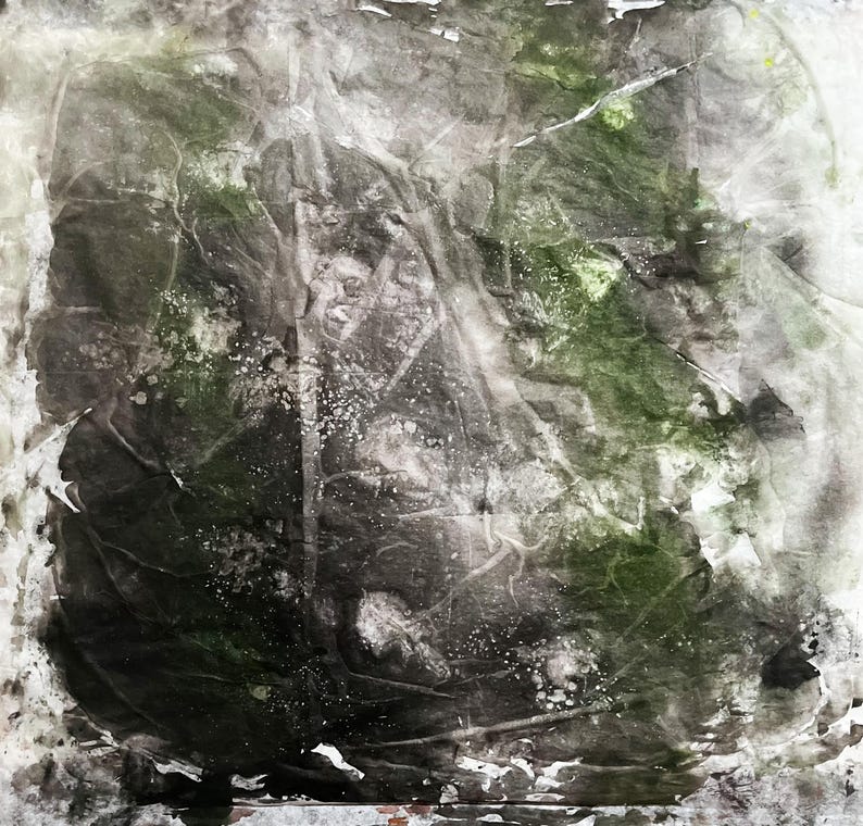 May include: A square piece of textured paper featuring an abstract composition of dark charcoal, black, and deep forest green pigments. The surface displays a crinkled, layered appearance with white splatters and translucent areas throughout.
