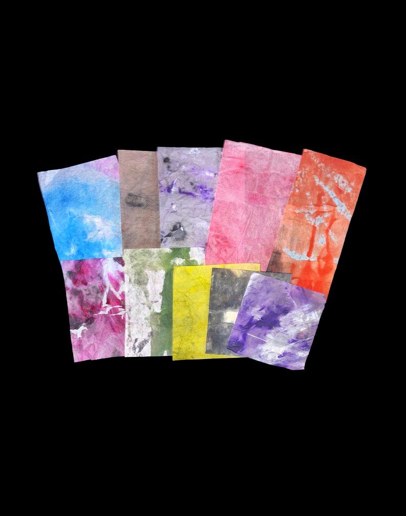 May include: A collection of ten rectangular sheets of textured paper, each featuring a unique abstract pattern in various colors including blue, pink, orange, yellow, purple, green, grey, and brown, arranged in a fan-like overlapping display.