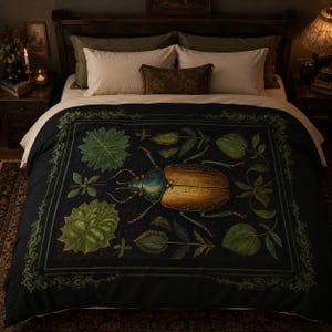 May include: Dark navy blue duvet cover featuring a large, detailed illustration of a beetle with a gold and blue body, surrounded by green leaves and vines. The bedding has a decorative green border and is set on a bed with white pillows.