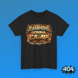 May include: A black short-sleeve t-shirt featuring a graphic print with the text "CAMPERS GONNA CAMP" in a camouflage pattern. The design includes an explosion effect, bullet casings, and a green crosshair target symbol centered on the word CAMP.