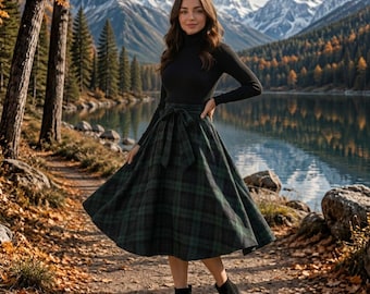 May include: A black long-sleeved turtleneck jumper paired with a high-waisted, midi-length skirt featuring a dark green and black plaid pattern, a wide waistband with a tie-front detail, and black ankle boots with a block heel.