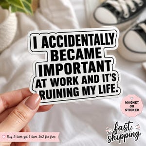 May include: A rectangular die-cut sticker with a white background and a black border featuring the bold black text: I ACCIDENTALLY BECAME IMPORTANT AT WORK AND IT'S RUINING MY LIFE. The sticker has a clean, modern sans-serif font style.