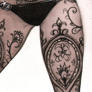May include: Black lingerie set with detailed lace patterns. The set includes a high-waisted bottom and a top with decorative chain accents. The design features floral and ornamental patterns, creating a delicate and elegant appearance.