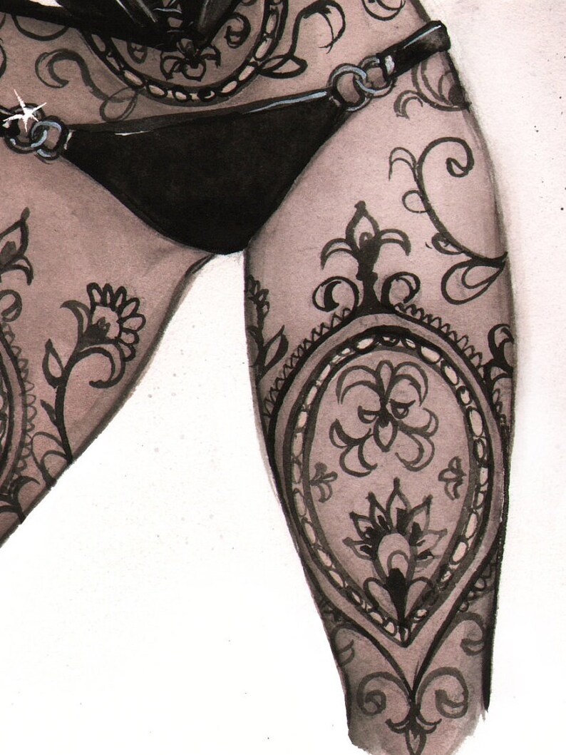 May include: Black lingerie set with detailed lace patterns. The set includes a high-waisted bottom and a top with decorative chain accents. The design features floral and ornamental patterns, creating a delicate and elegant appearance.