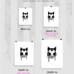 May include: Gicl&eacute;e print sizing guide showing a black and white cat skull design. Prints are available in sizes: 20.3x25.4 cm, 30.5x40.6 cm, 40.6x50.8 cm, and 45.7x61 cm. The text "Gicl&eacute;e Print Sizing" is at the top.