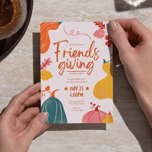May include: A Friendsgiving dinner party invitation with colorful illustrations of pumpkins and leaves. The invitation includes the date, time, and RSVP information. The text reads "Join us for a Friendsgiving Dinner Party."