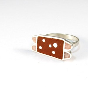 playful ring on sterling silver andinlay stone color red and pink