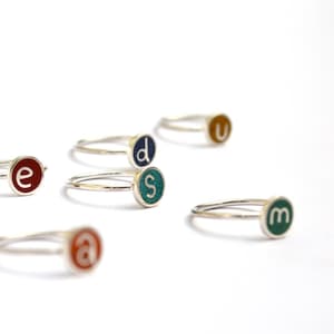 playful stelring silver initial ring witht stone color inlay