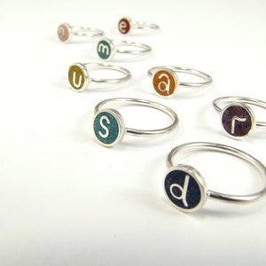 playful rings with initial color on sterling silver by maldonado jewelry