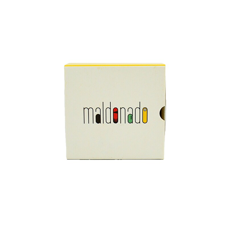 May include: A white box with a yellow top and the word "maldonado" in black letters with colored accents.