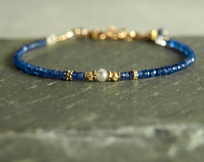 White gold finish Oval blue sapphire created diamond tennis bracelet