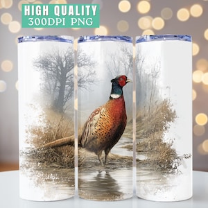 May include: A white tumbler featuring a detailed illustration of a pheasant in a naturalistic setting. The bird has vibrant red, brown, and black plumage. The text "HIGH QUALITY 300DPI PNG" is at the top.