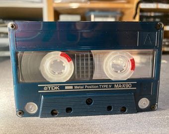 TDK MA-X90 Metallkassettenband. Gebraucht, getestet, spielt prima, selten. Hochwertiges Sammlerklebeband Typ IV mit kratzfreier Hülle.
