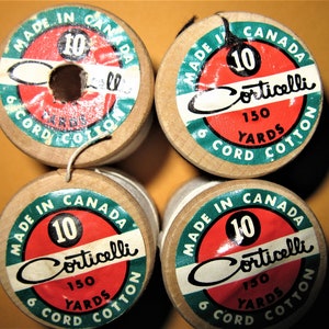 May include: Four spools of 10-ply Corticelli 6 cord cotton thread, each spool is 150 yards long and made in Canada.