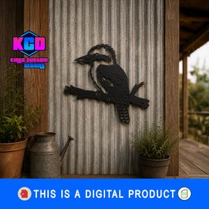 May include: Black metal kookaburra wall art on a corrugated metal background. The bird is perched on a branch. The image includes potted plants, a watering can, and the text "THIS IS A DIGITAL PRODUCT."