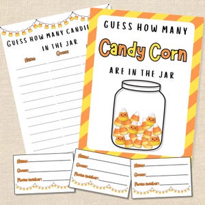 May include: Halloween-themed game set with a "Guess How Many Candy Corn" theme. Includes a large game card, smaller guess cards, and a jar graphic filled with candy corn. The cards have a white background with orange and yellow accents.