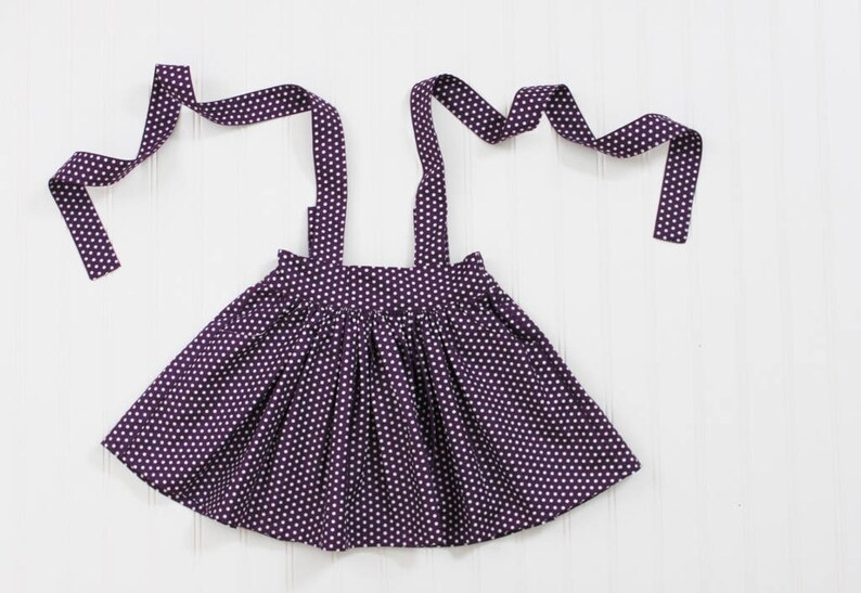 purple school pinafore
