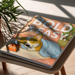 May include: A coloring book titled BOLD & EASY! featuring a cartoon corgi sleeping under a blue polka dot blanket next to an orange mug labeled COZY. The cover text reads 10 COZY PETS COLORING PAGES FOR ADULTS in white lettering on a peach background.