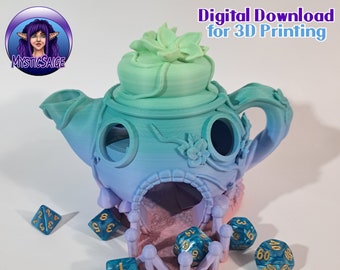 May include: A teal and purple teapot with a green succulent on top, designed for 3D printing. The teapot has a small opening on the side and a larger opening on the front. The text "Digital Download for 3D Printing" is at the top of the image. The text "Print-in-Place No Supports" is at the bottom of the image.