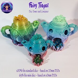May include: A teal, green, and yellow 3D printed teapot with a flower on top. The teapot is a dice tower and container. The text "Fairy Teapot" and "Dice Tower and Container" is above the teapot. The text "100% fits standard dice - based on 20mm D20s" and "65% fits mini dice - based on 10mm D20s" is below the teapot.