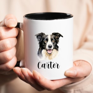 May include: White ceramic mug with a black interior and handle. The mug features a watercolor portrait of a Border Collie dog with black, white, and tan fur. The name "Carter" is printed below the dog's image in a script font.