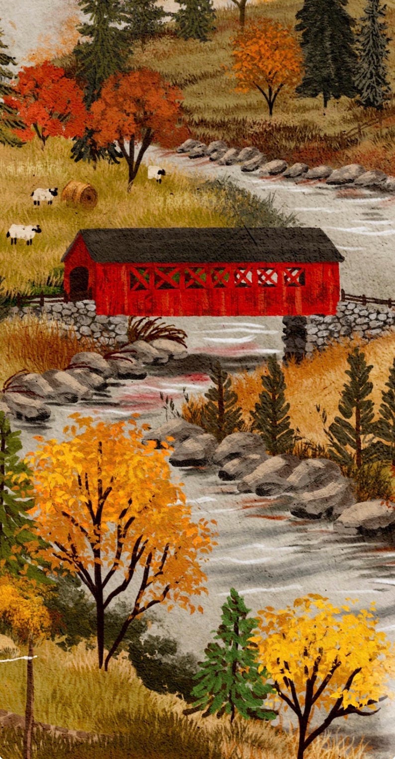 May include: A painting of a bright red covered bridge spanning a rocky stream in an autumn landscape. The scene features golden and orange trees, green pine trees, and a grassy hillside with small white sheep and a hay bale under a cloudy sky.