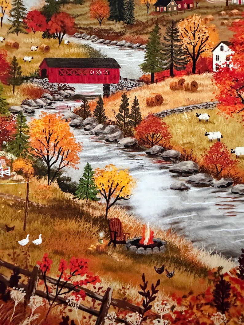 May include: A detailed painting of an autumn landscape featuring a red covered bridge over a flowing stream, a stone fire pit with flames, a wooden chair, grazing sheep, chickens, hay bales, trees with orange and yellow foliage, and houses.