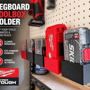 May include: A set of black and red plastic pegboard toolbox holders mounted on a white pegboard. The holders contain various tool cases and batteries, including a red Milwaukee battery and a Skil bit set case. Text on the image reads PEGBOARD TOOLBOX HOLDER, KEEP YOUR TOOLS ORGANIZED & WITHIN REACH, CLEANER WORKSPACE, FITS STANDARD PEGBOARD, DURABLE 3D PRINTED, Milwaukee, and HYPER TOUGH.