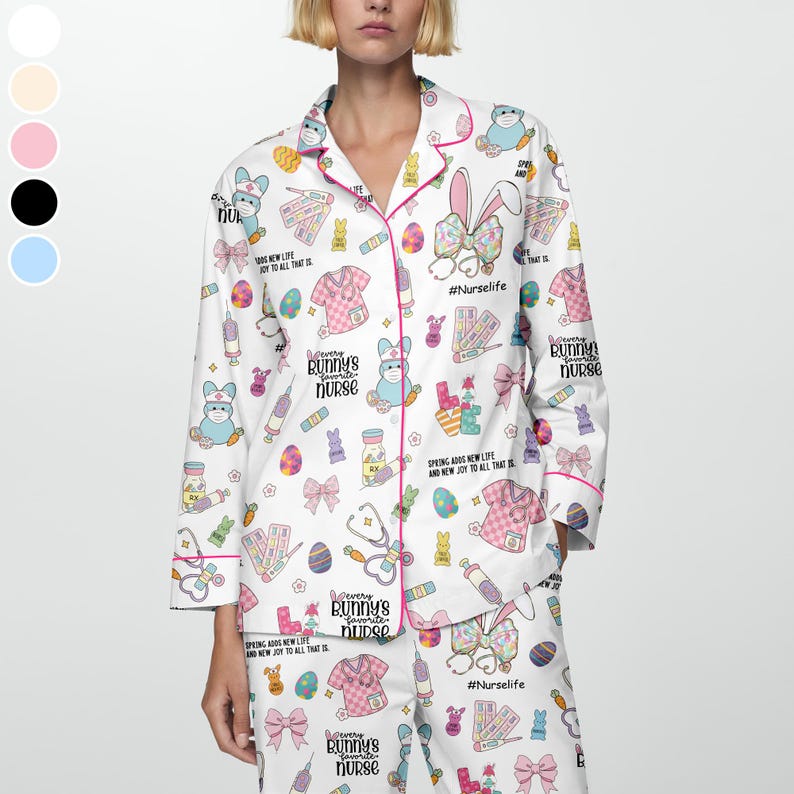 May include: White pajama set with a repeating pattern of Easter bunnies, medical supplies, and text. The set includes a button-down shirt with pink trim and matching pants. The text includes "Every bunny's favorite nurse" and "#NurseLife".