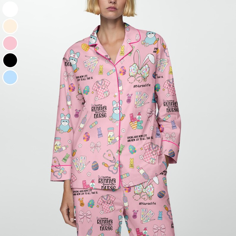 May include: Pink pajama set with a repeating pattern of Easter bunnies wearing masks, medical supplies, and text. The set includes a button-down shirt with pink piping and matching pants. The text includes "Bunny's favorite nurse" and "#Nurselife".