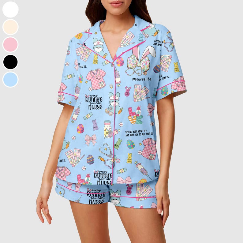 May include: Light blue pajama set with a bunny and medical-themed print. The short-sleeved top and shorts feature pink trim and the text "Every Bunny's Favorite Nurse." The set includes images of bunnies, stethoscopes, and medical supplies.